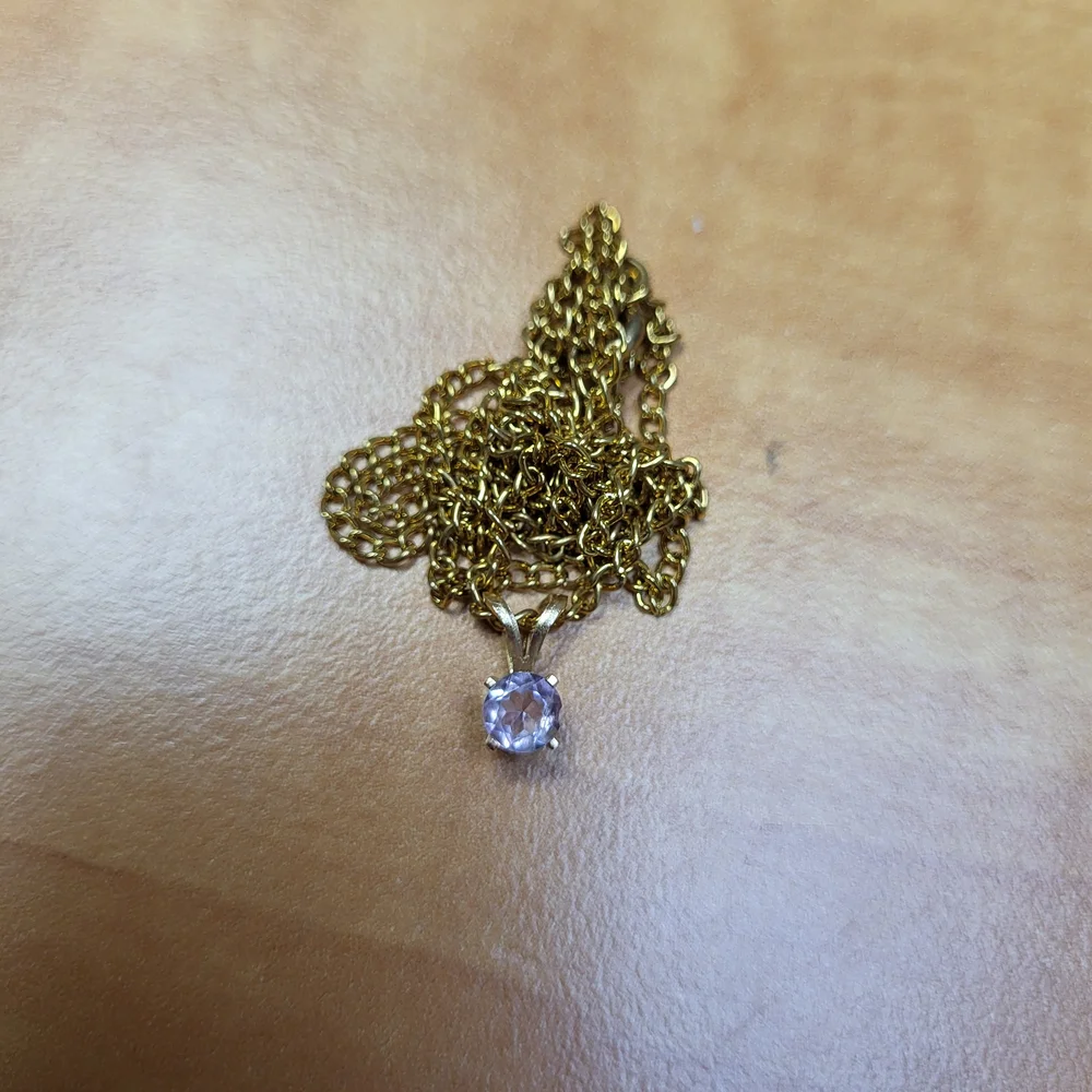 Elegant Gold Necklace with Purple Pendant